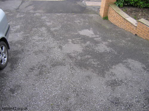 Somehow blank driveway.