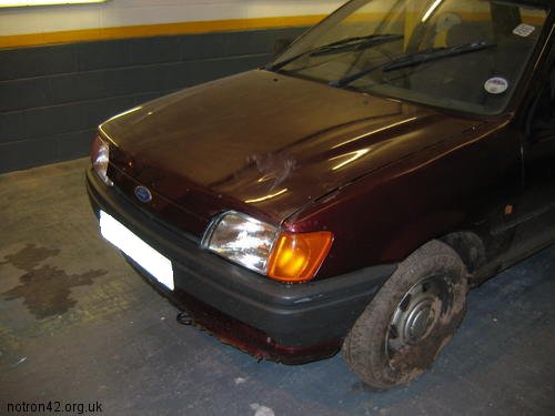 Front passenger side notice the mud on the wheel.